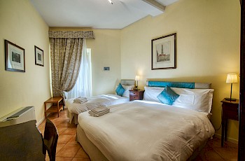 Albergo Orologio - Rooms - camera-tripla.jpg